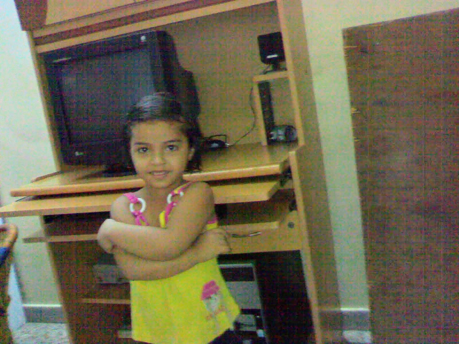 Iqra at our desk in Gurgaon, July 2009
